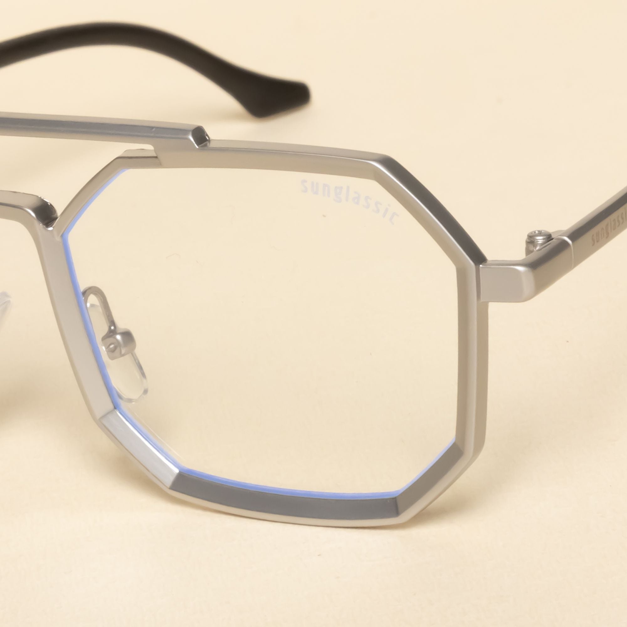 Commando silver clear square sunglasses with anti-blue light lenses. Reduces eye strain and fatigue from long screen time.