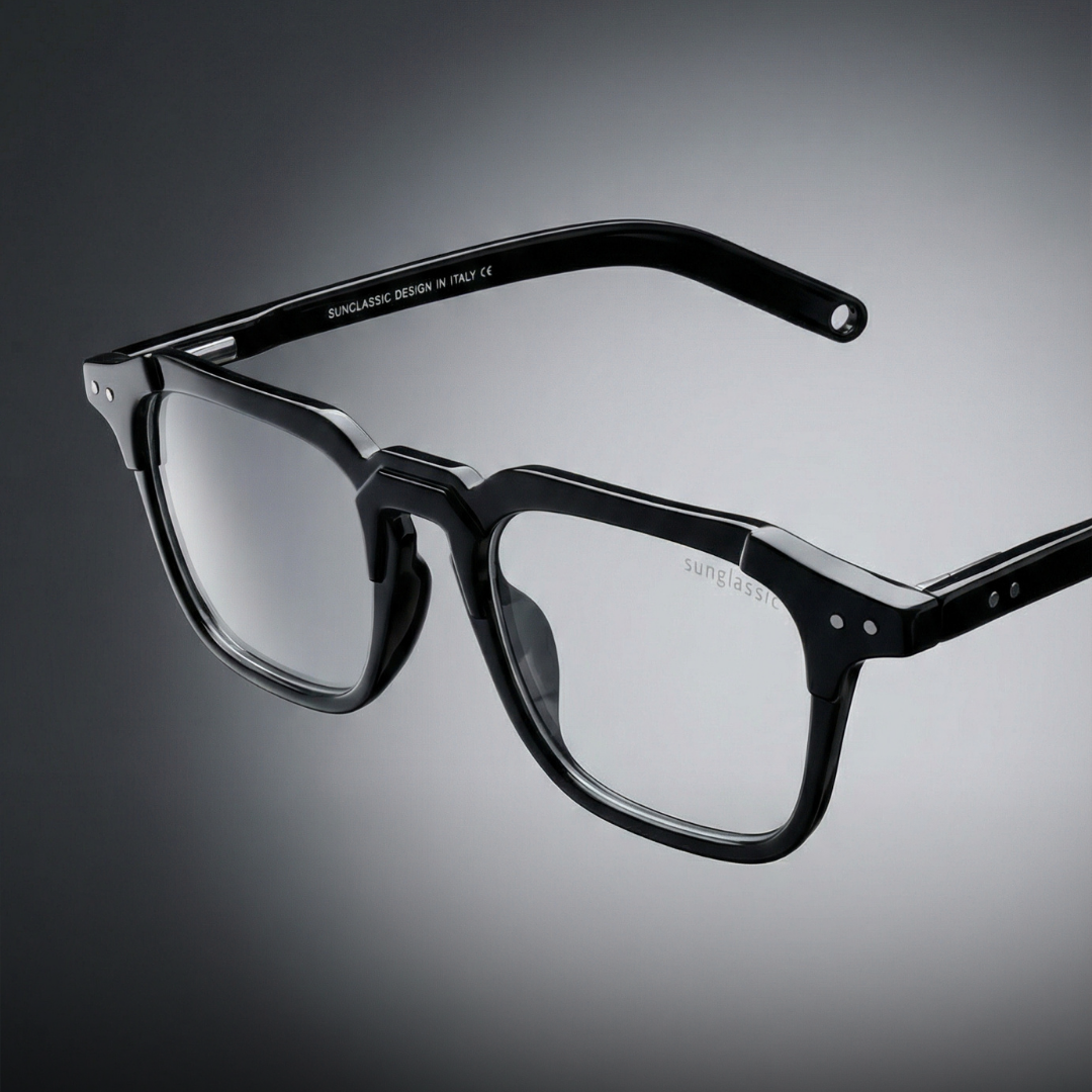 Black eyeglasses on a gradient gray background with 'Kingsman' branding.