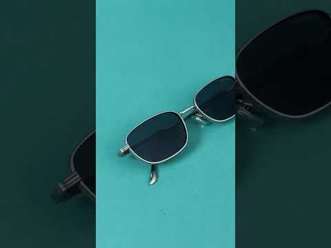 Regal Silver Black Oval Sunglasses by Sunglassic – close-up view showing premium frame and lens details