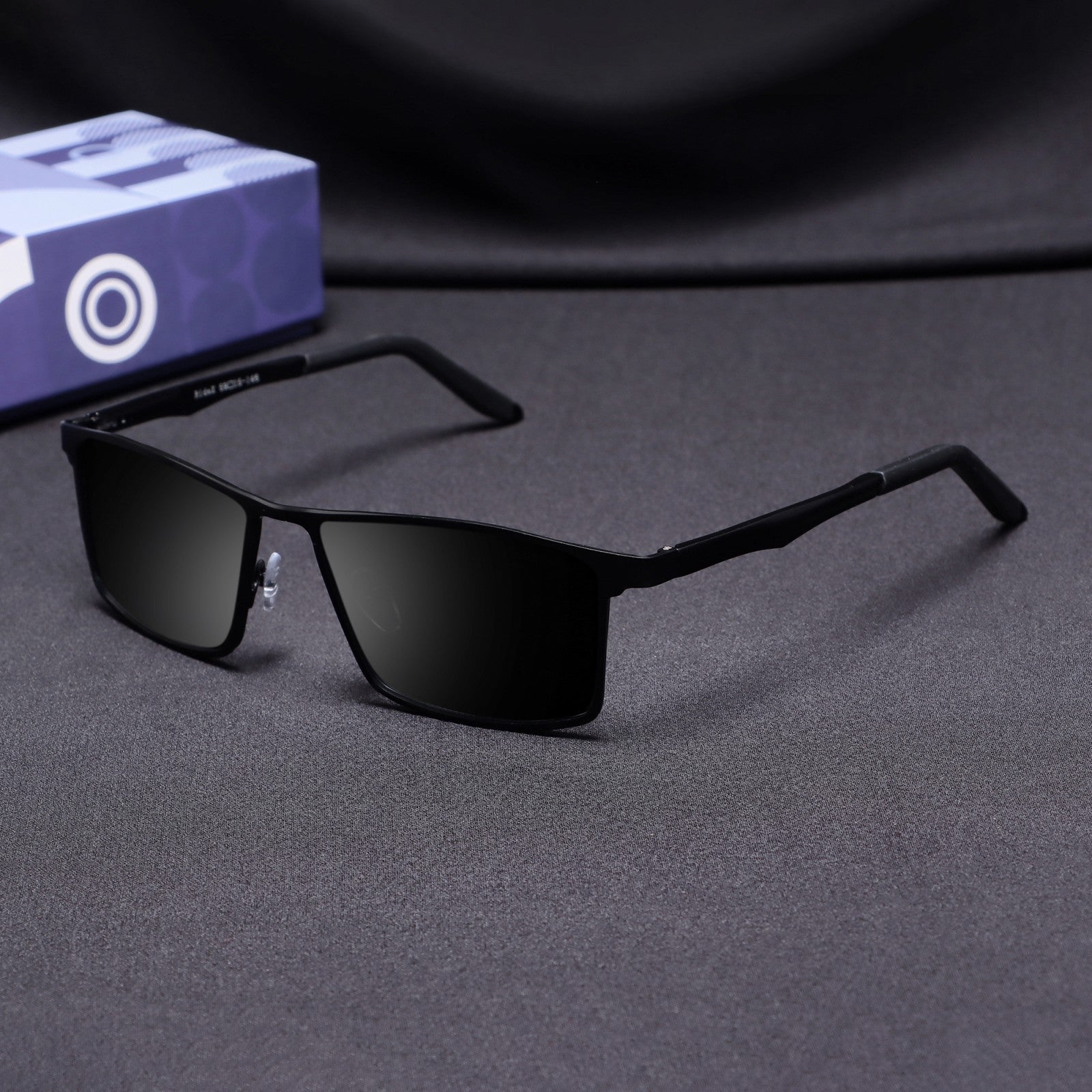 RideX black rectangle sunglasses front view on white background