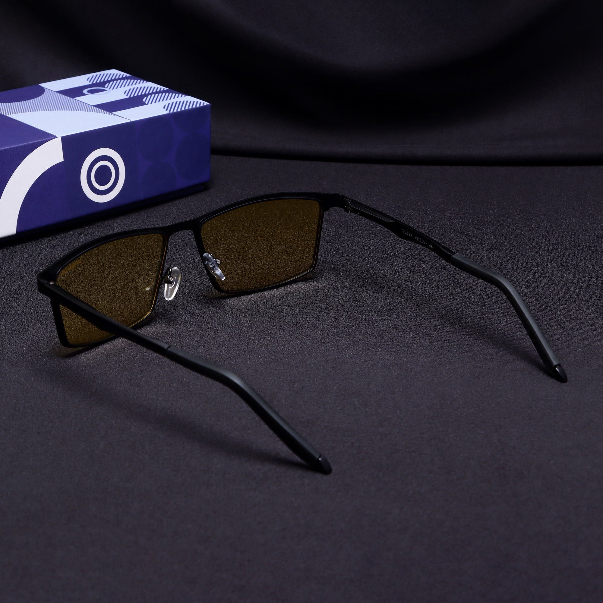 Rear view of RideX rectangle sunglasses showing frame bend and arms