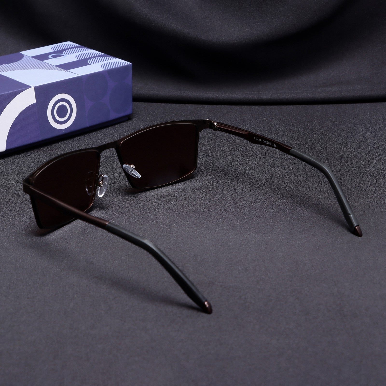 Rear view showing arms and build of RideX brown sunglasses