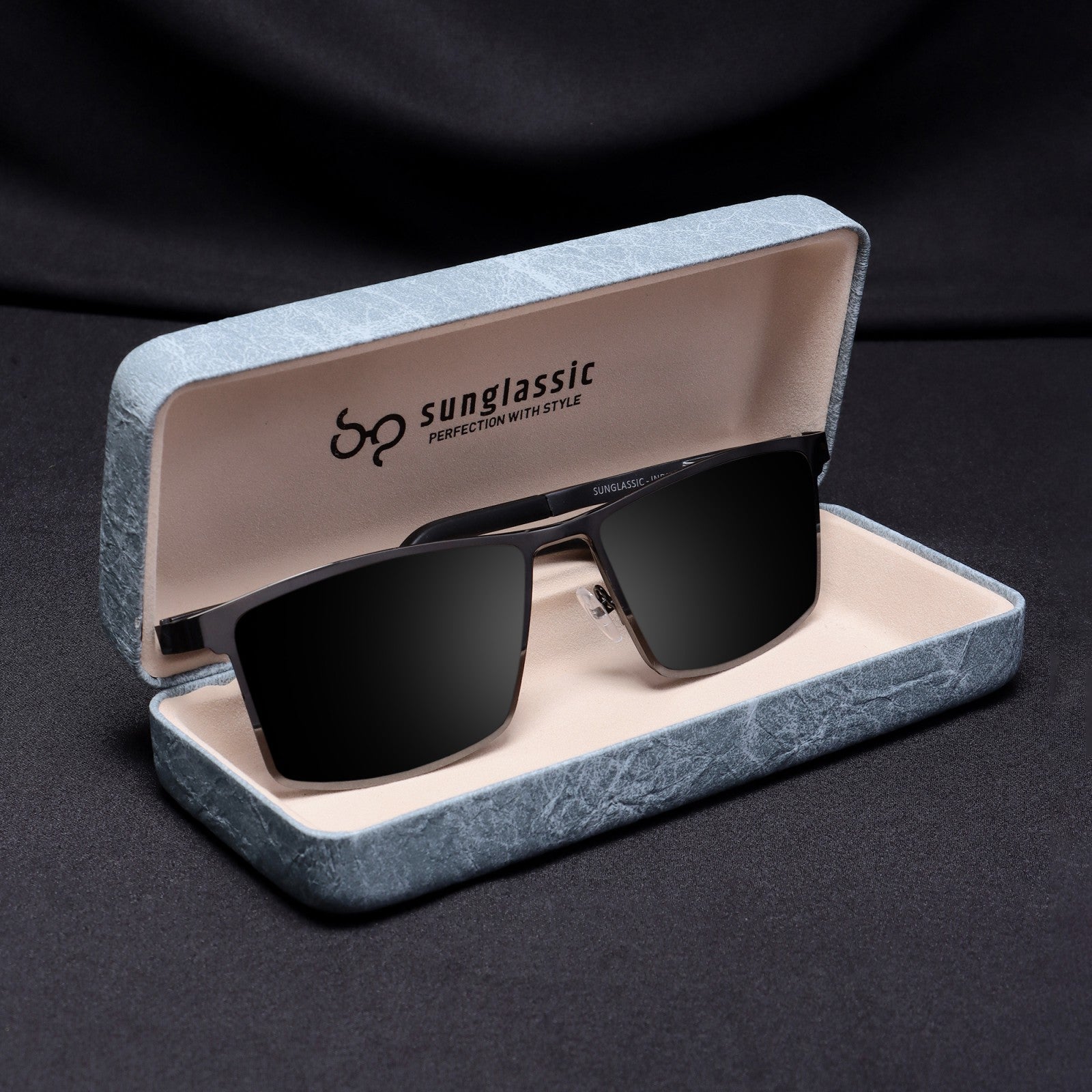 RideX gray black sunglasses placed in Sunglassic box
