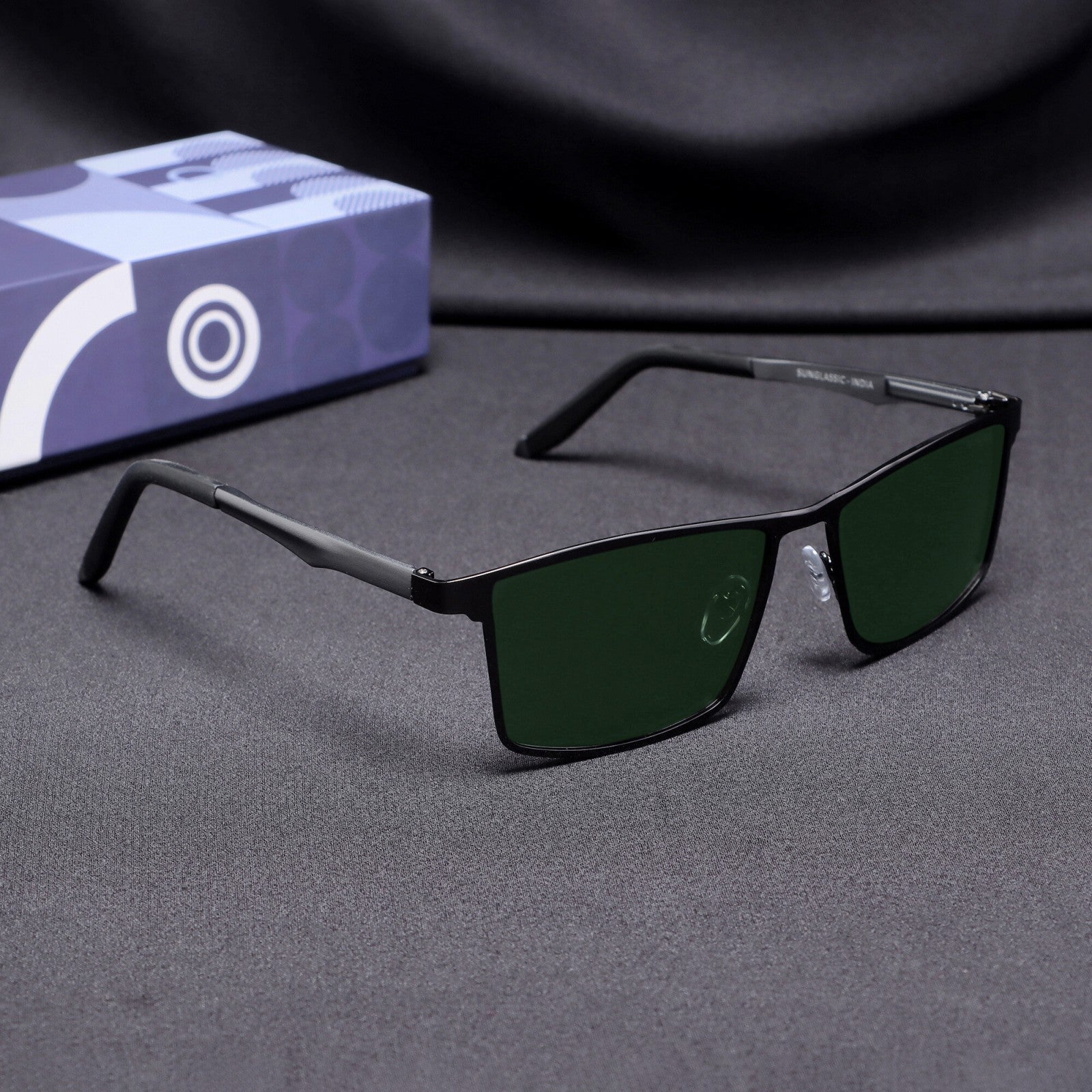 Side angle of RideX gray metal sunglasses with green polarized lenses