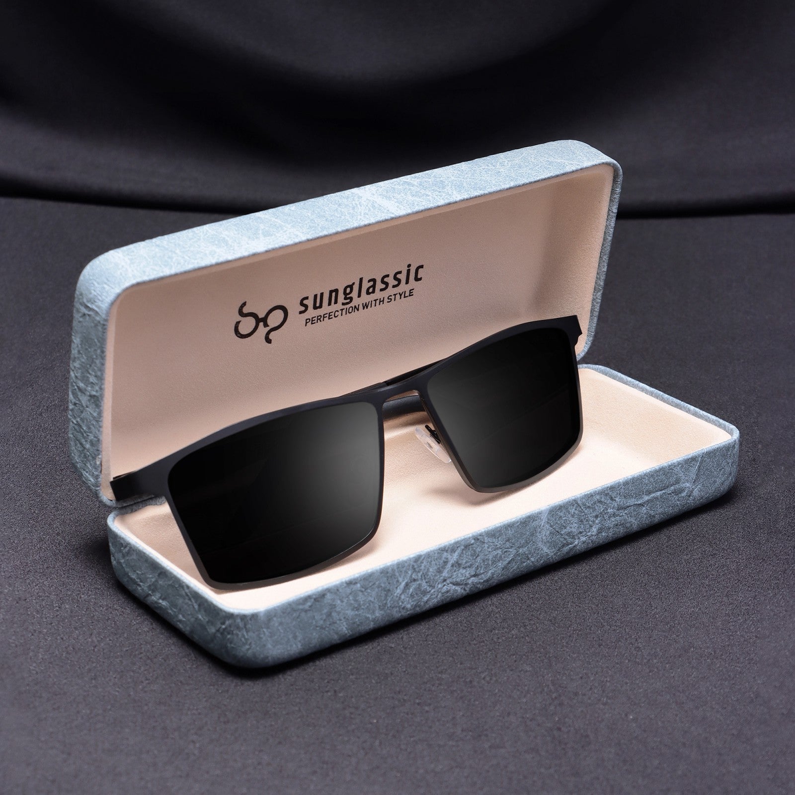 RideX black sunglasses placed inside Sunglassic box