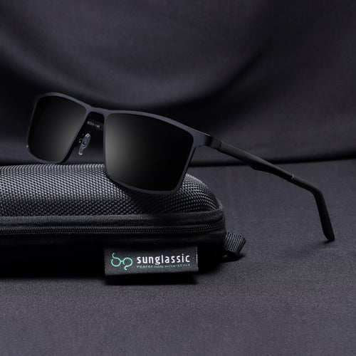 RideX black frame sunglasses resting on soft branded pouch