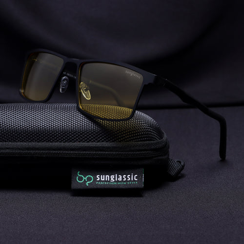 RideX sunglasses resting on Sunglassic black pouch with brand tag
