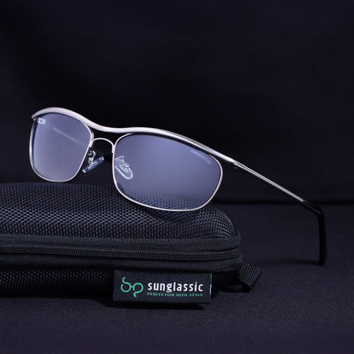 Sunglasses with a black case on a dark background, featuring the Sunglassic brand.