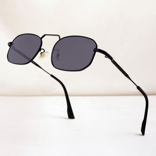 Black sunglasses with dark lenses on a white background
