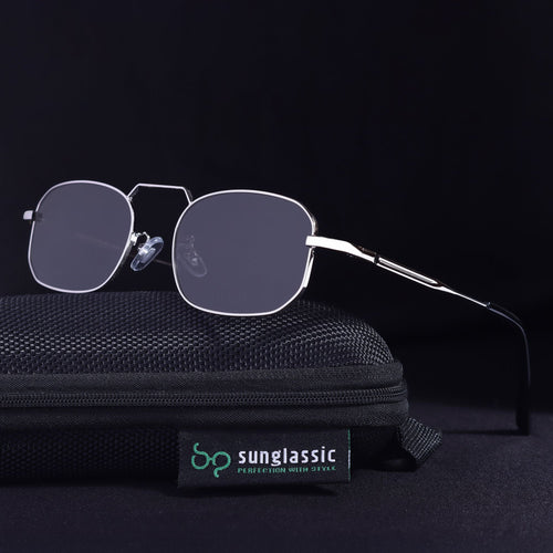 Sunglasses on a black textured surface with 'Sunglassic' branding.